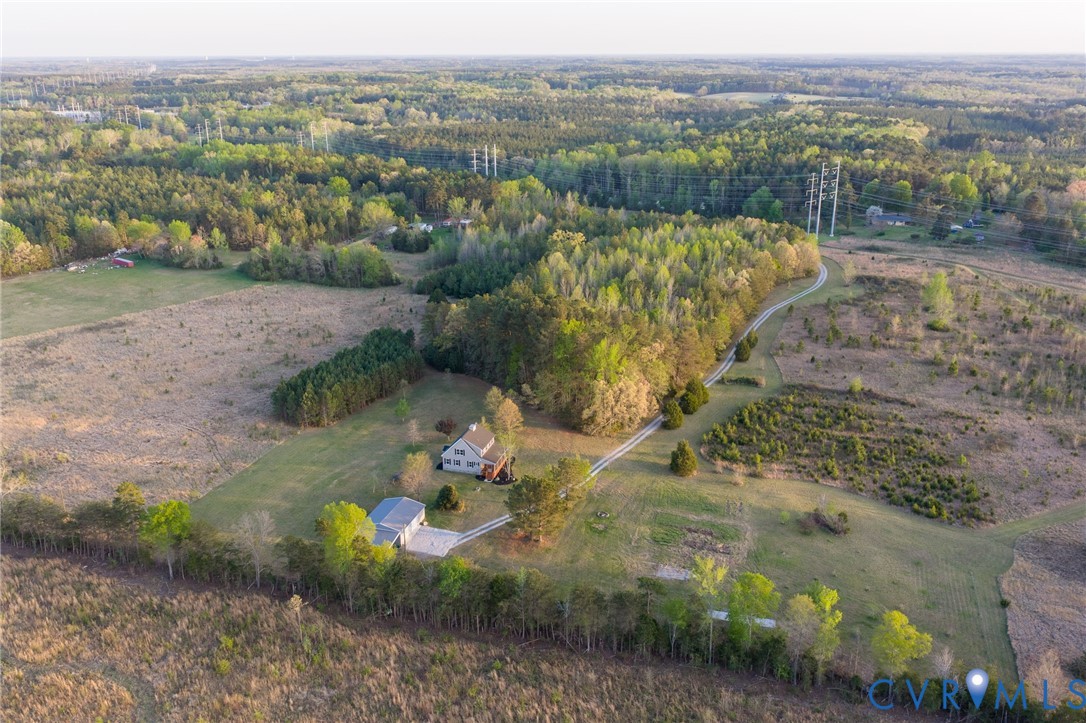 1895 Cemetery Road Chase City, VA 23924 - Photo 77 of 83 an aerial view of a house with a yard