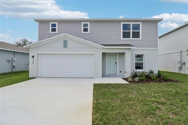 a front view of house with yard