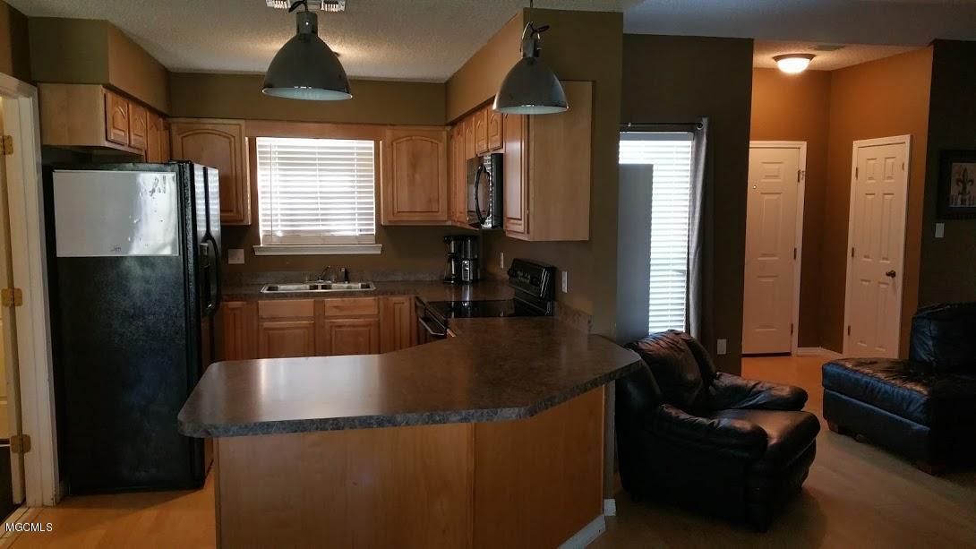 9494 Joncie Road Biloxi, MS 39532 - Photo 30 of 30 KITCHEN LIVING OPEN FLOOR PLAN