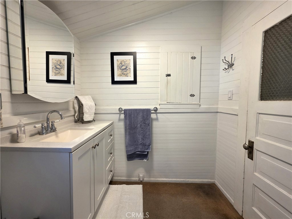1414 Marin Street Corning, CA 96021 - Photo 14 of 43 a bathroom with a sink a toilet and shower