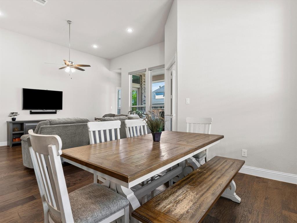 1630 Pebblebrook Lane Prosper, TX 75078 - Photo 20 of 40 a view of a dining room with furniture