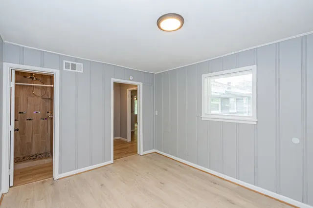 an empty room with windows