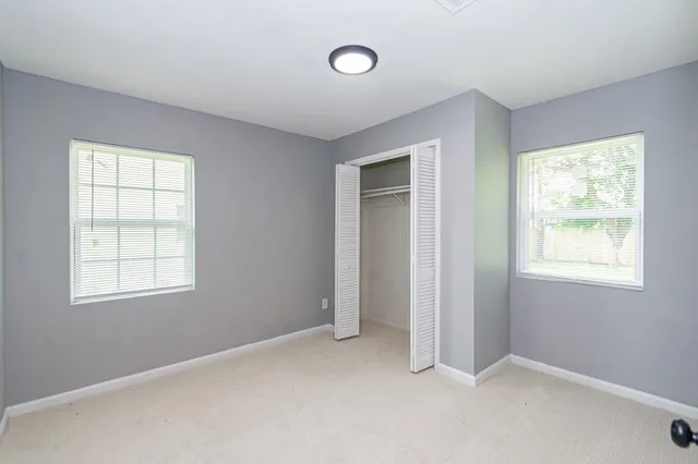 an empty room with windows