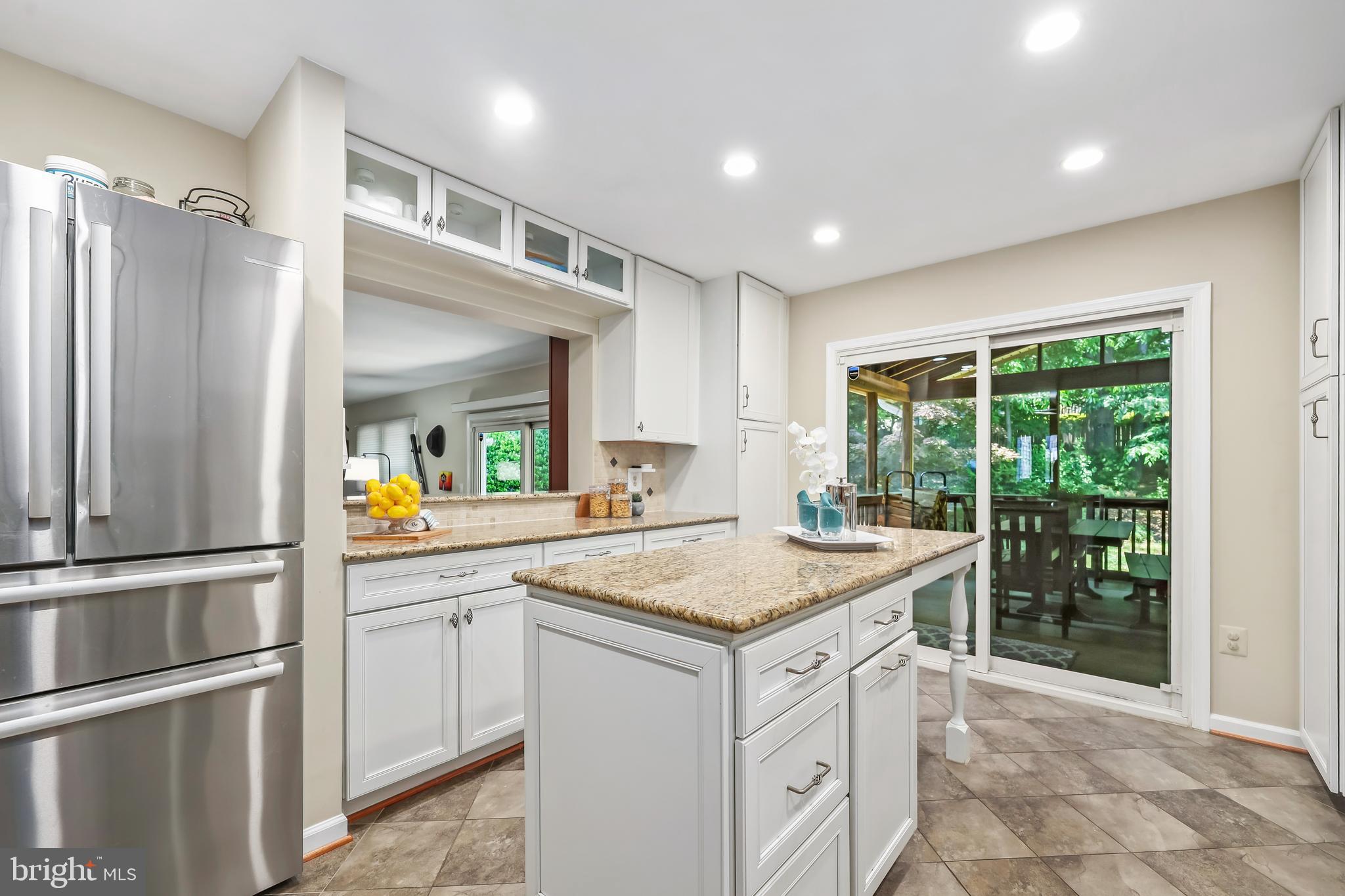9217 Rockefeller Lane Springfield, VA 22153 - Photo 11 of 41 Gourmet Kitchen with Center Island and Storage