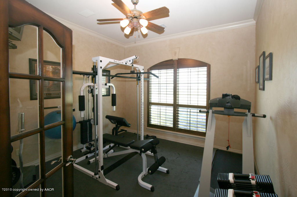 9000 Blackhawk Road Amarillo, TX 79119 - Photo 27 of 39 a view of a room with gym equipment