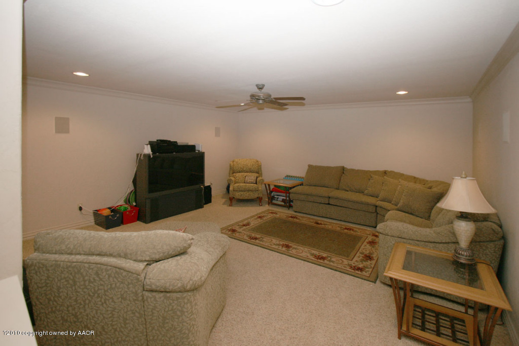 9000 Blackhawk Road Amarillo, TX 79119 - Photo 30 of 39 a living room with furniture and a air conditioner vent