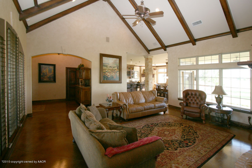 9000 Blackhawk Road Amarillo, TX 79119 - Photo 5 of 39 a living room with furniture and a large window