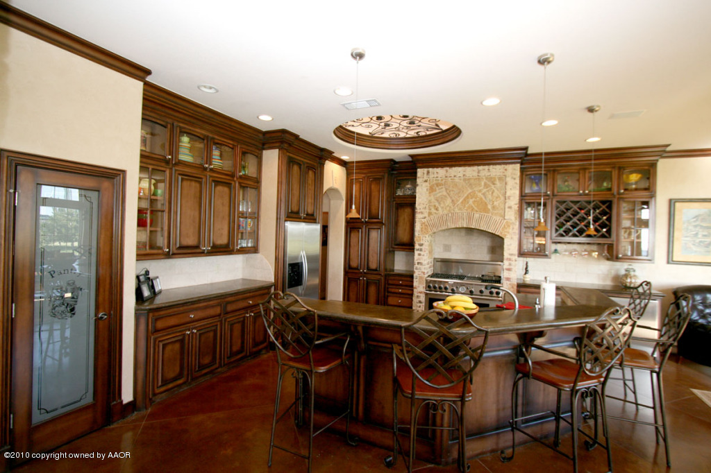 9000 Blackhawk Road Amarillo, TX 79119 - Photo 6 of 39 a view of a dining room with furniture and a large window