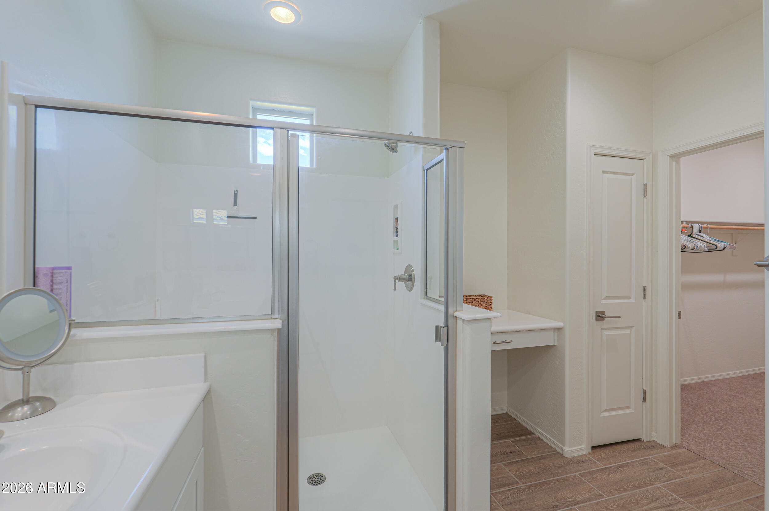 42085 West Cribbage Road Maricopa, AZ 85138 - Photo 25 of 35 a bathroom with a shower and a sink
