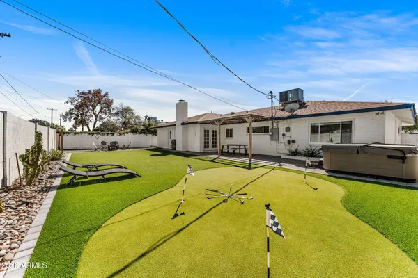 a view of a house with swimming pool
