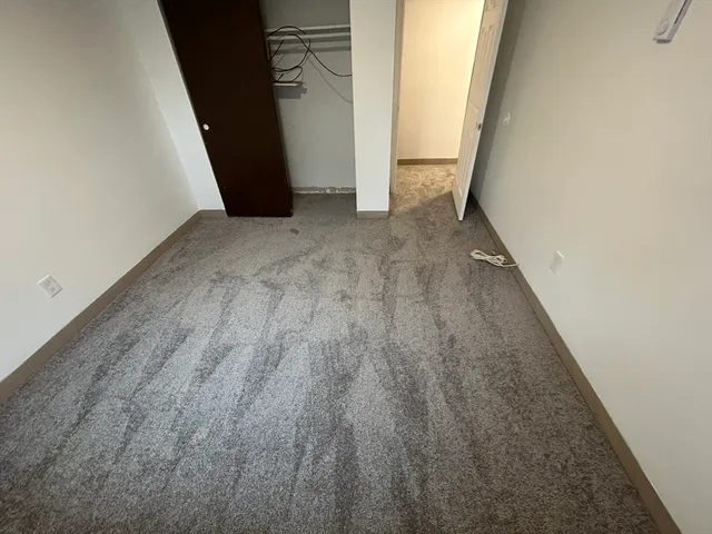 a view of a big room with wooden floor