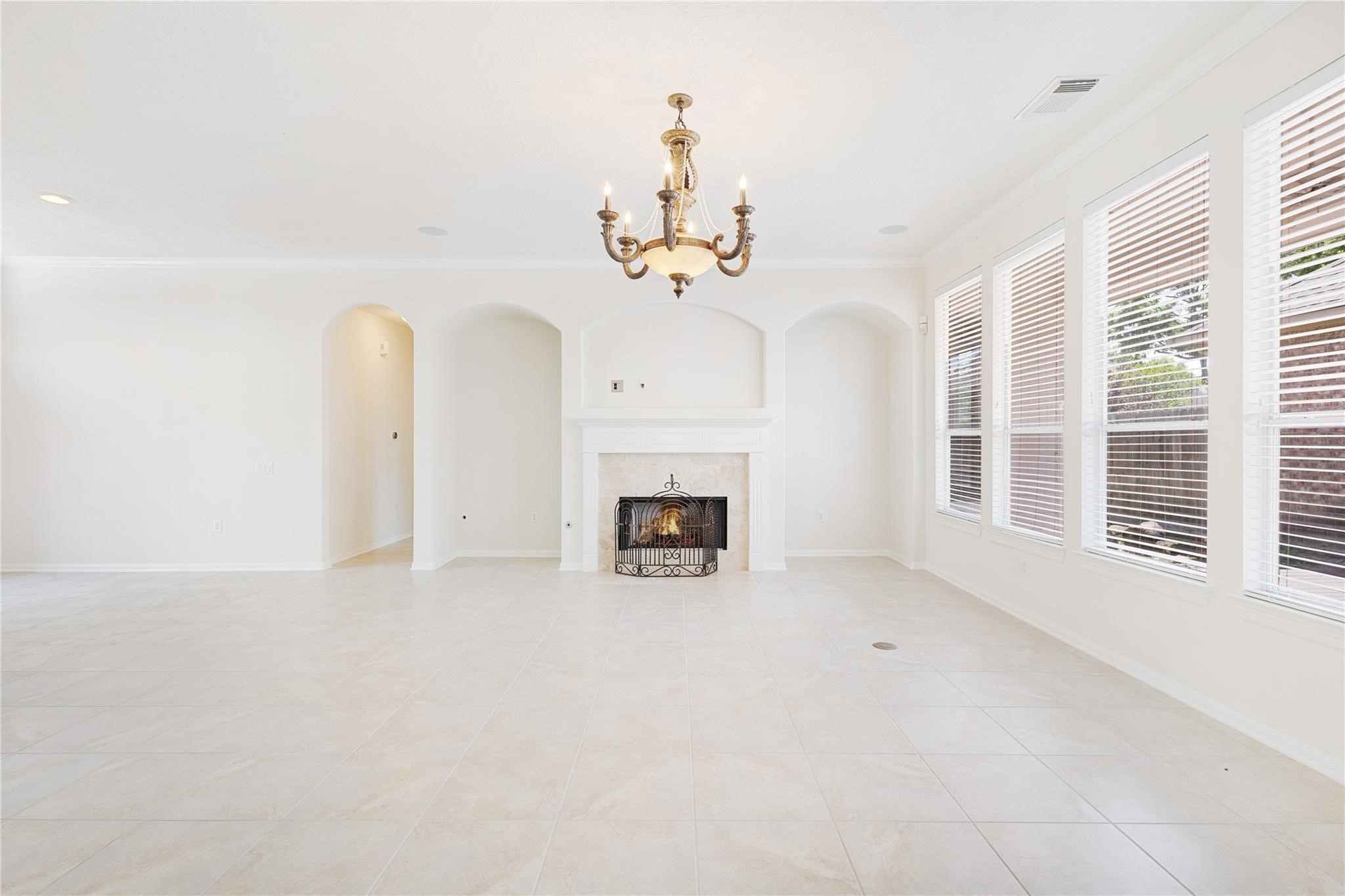 43 Tarrytown Way Conroe, TX 77384 - Photo 15 of 40 a view of an empty room with a fireplace