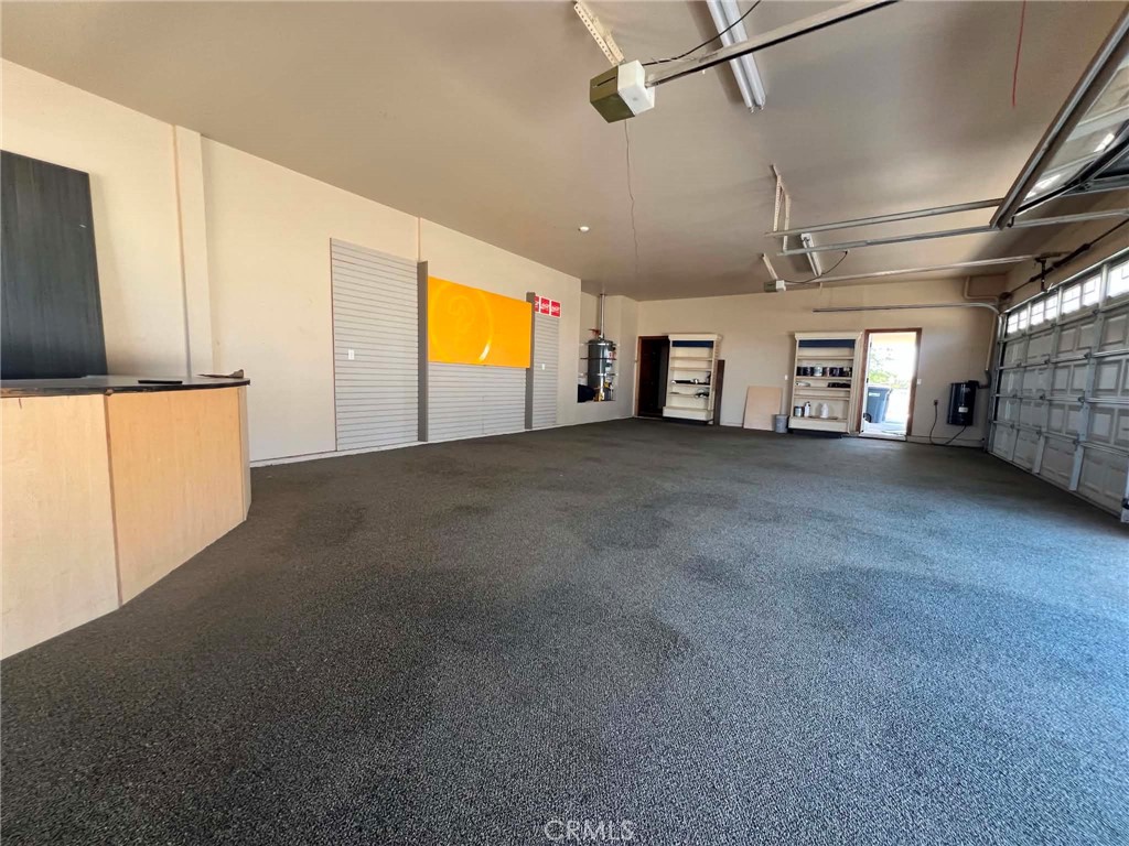 9126 Kittering Road Oak Hills, CA 92344 - Photo 45 of 47 inside garage