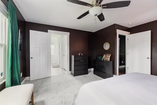 a view of room with a sink and a mirror