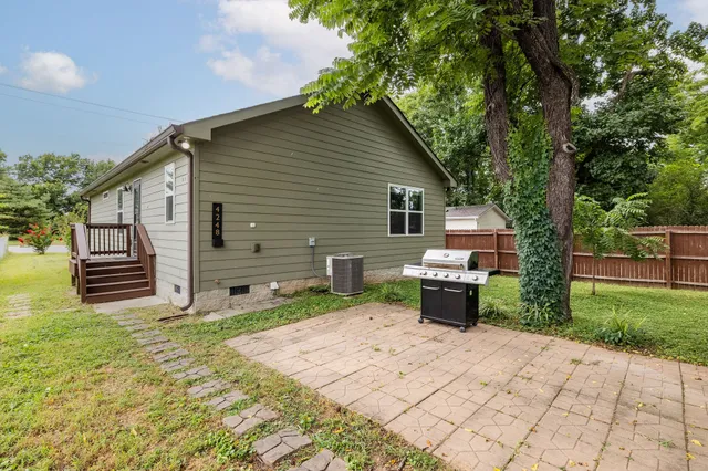 a view of backyard with green space