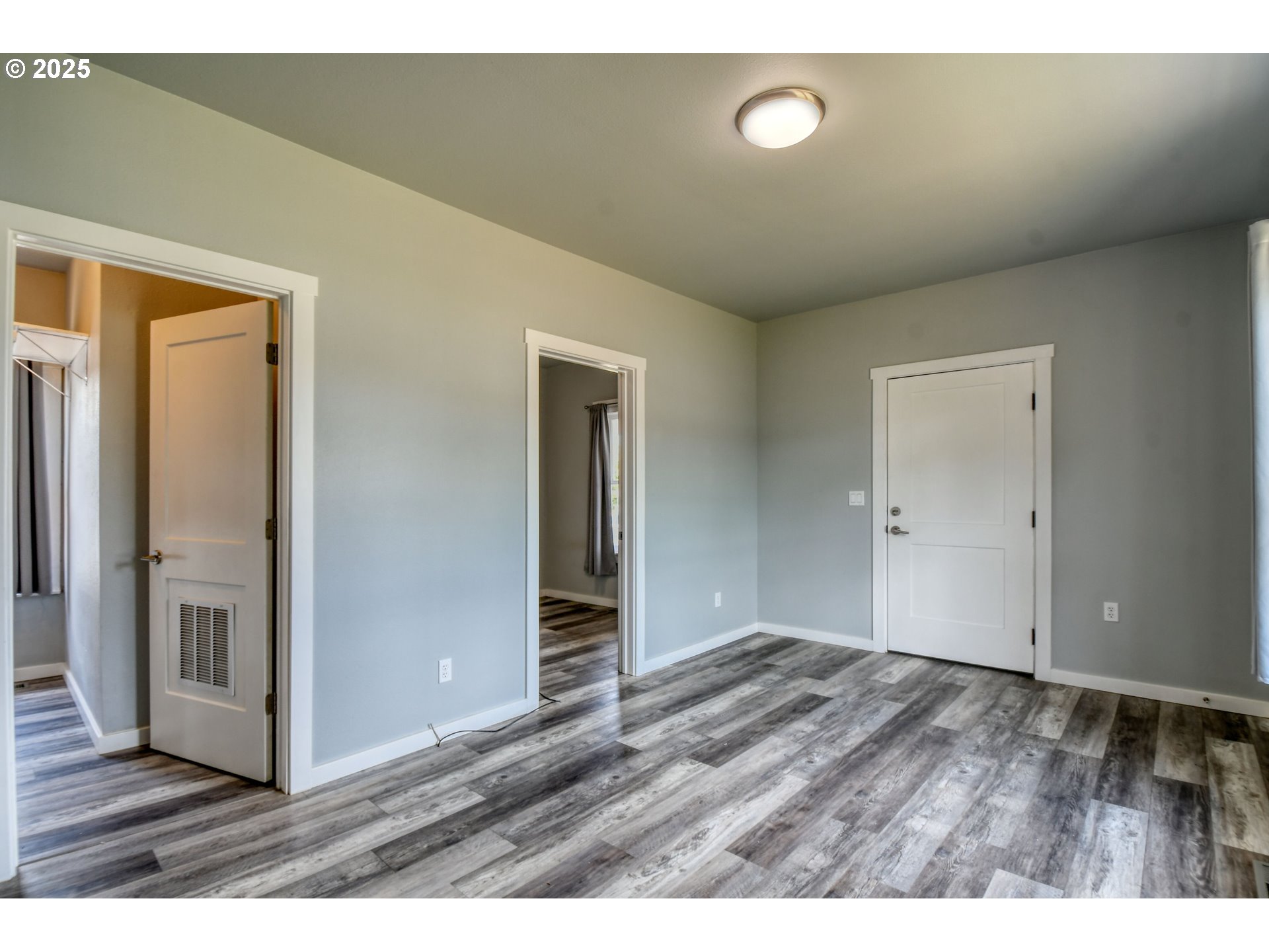 1408 Southwest Frazer Avenue Pendleton, OR 97801 - Photo 7 of 24 a view of an empty room and wooden floor