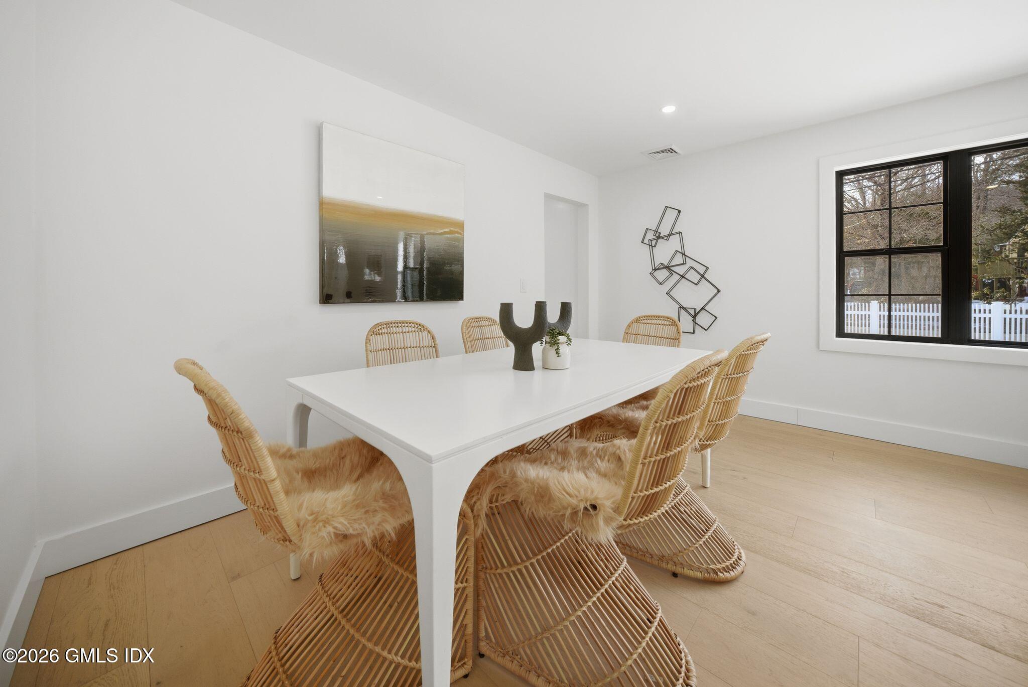101 Parade Hill Road New Canaan, CT 06840 - Photo 21 of 40 a view of a dining room with furniture