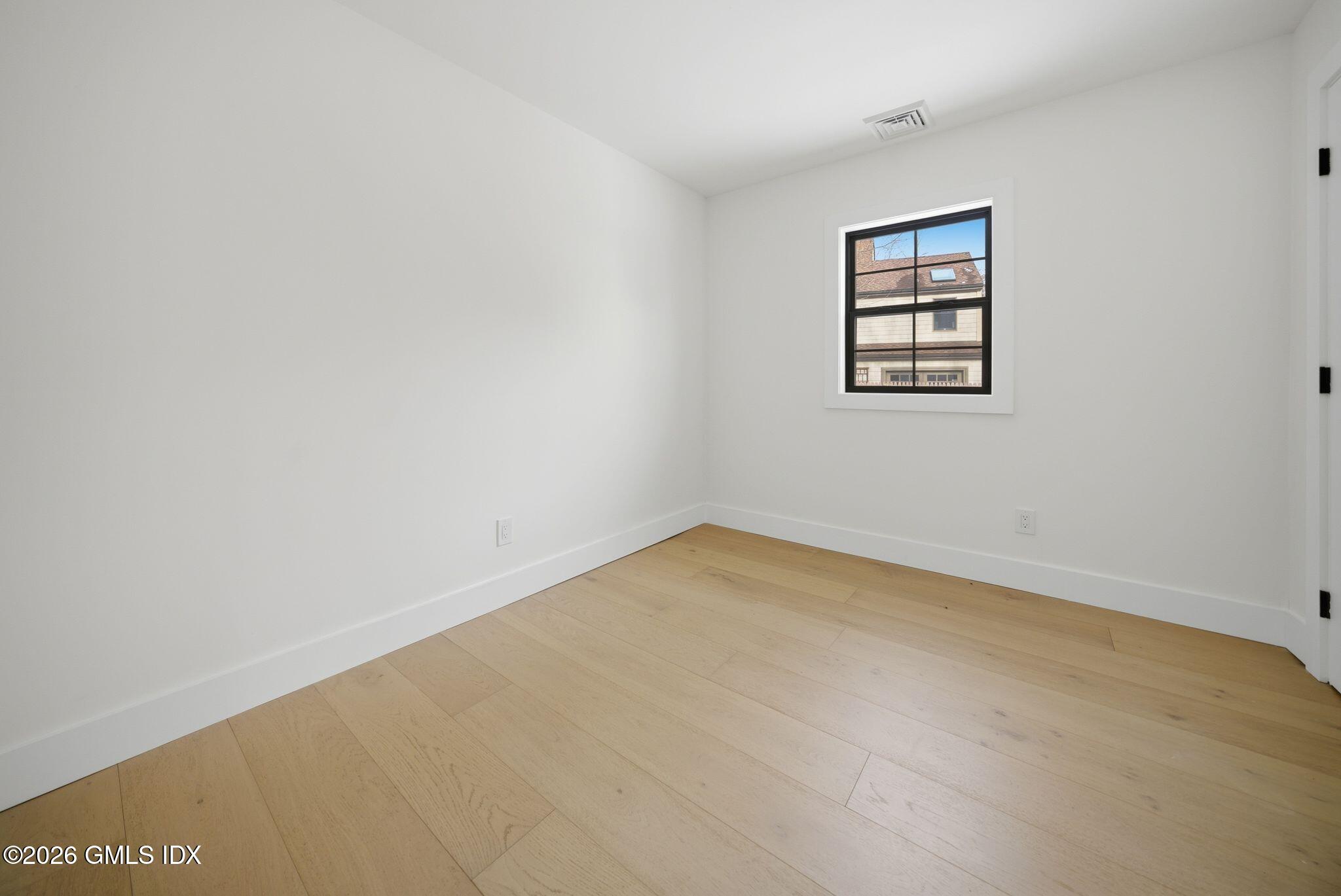 101 Parade Hill Road New Canaan, CT 06840 - Photo 32 of 40 an empty room with a window