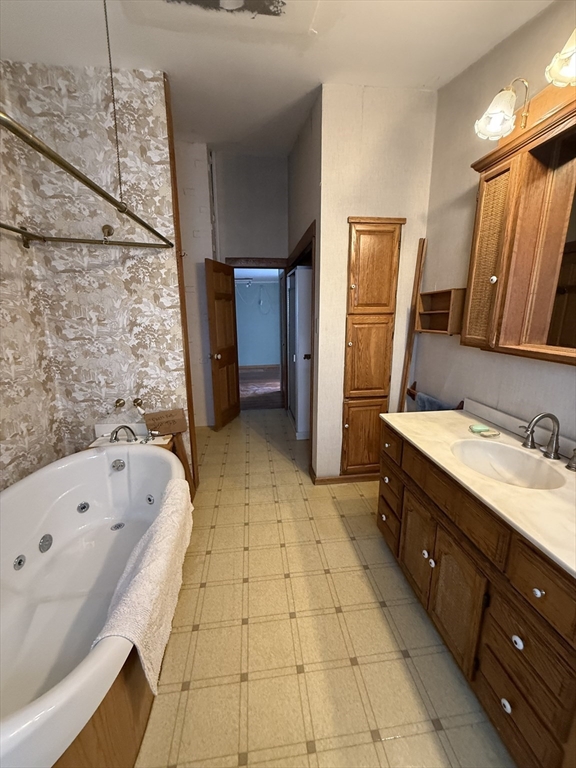 3 Ferry Road Haverhill, MA 01835 - Photo 17 of 30 a bathroom with a tub sink and mirror