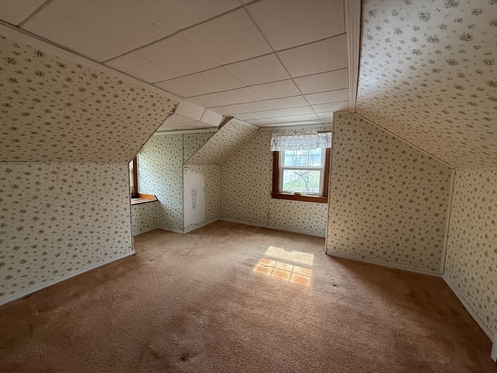 3 Ferry Road Haverhill, MA 01835 - Photo 22 of 30 a view of a livingroom with an empty space and a window