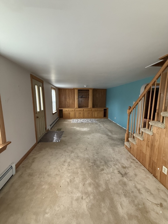 3 Ferry Road Haverhill, MA 01835 - Photo 24 of 30 a view of an empty room with stairs and a window