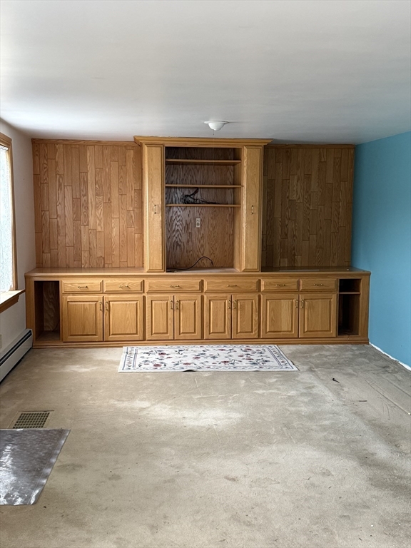 3 Ferry Road Haverhill, MA 01835 - Photo 25 of 30 a view of an empty room with wooden floor and cabinet