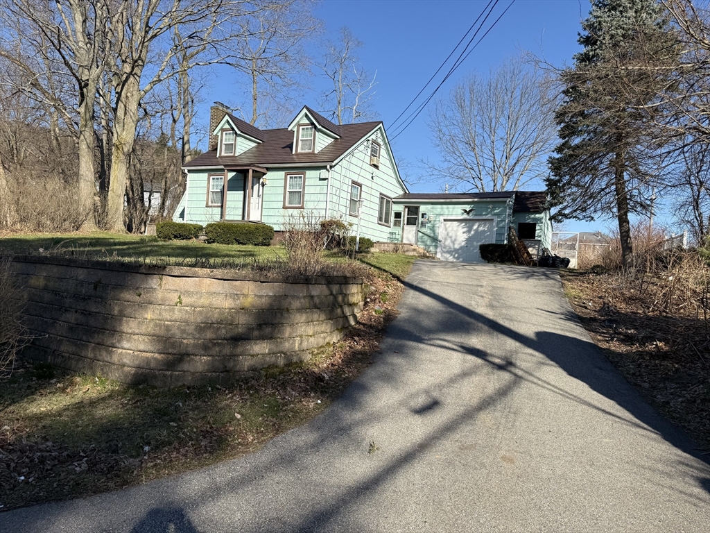 3 Ferry Road Haverhill, MA 01835 - Photo 4 of 30 a view of a house with a yard patio and fire pit