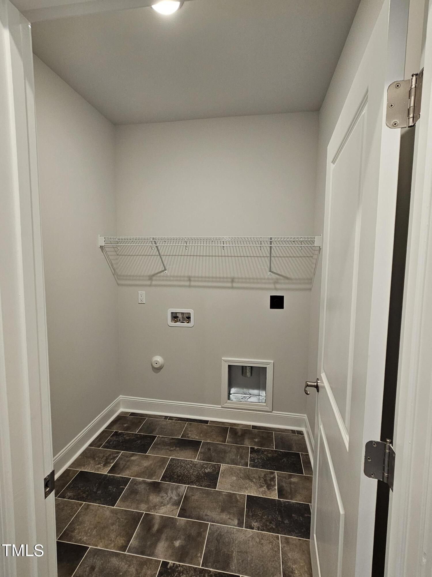 28 Decatur Drive Fuquay-Varina, NC 27526 - Photo 19 of 26 Laundry room