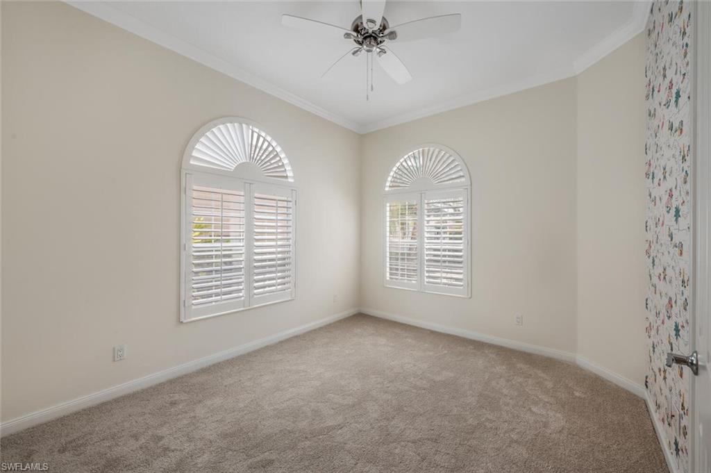 8511 Alessandria Court Naples, FL 34114 - Photo 15 of 45 a view of an empty room with a window