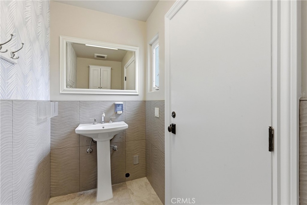 29131 Bouquet Canyon Road Silverado, CA 92676 - Photo 35 of 74 Outdoor shower and pool bathroom access from backyard