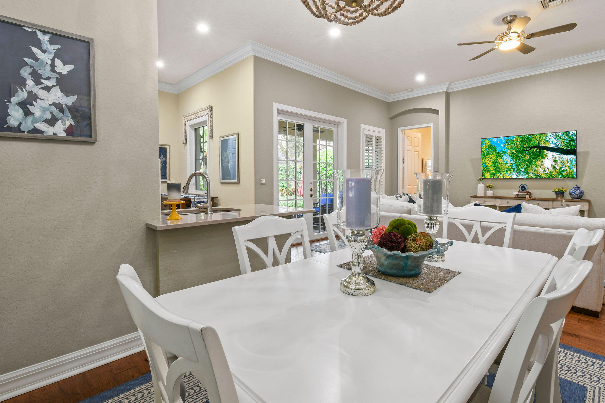 167 Arklow Avenue Jupiter, FL 33458 - Photo 16 of 58 a living room with furniture and a flat screen tv