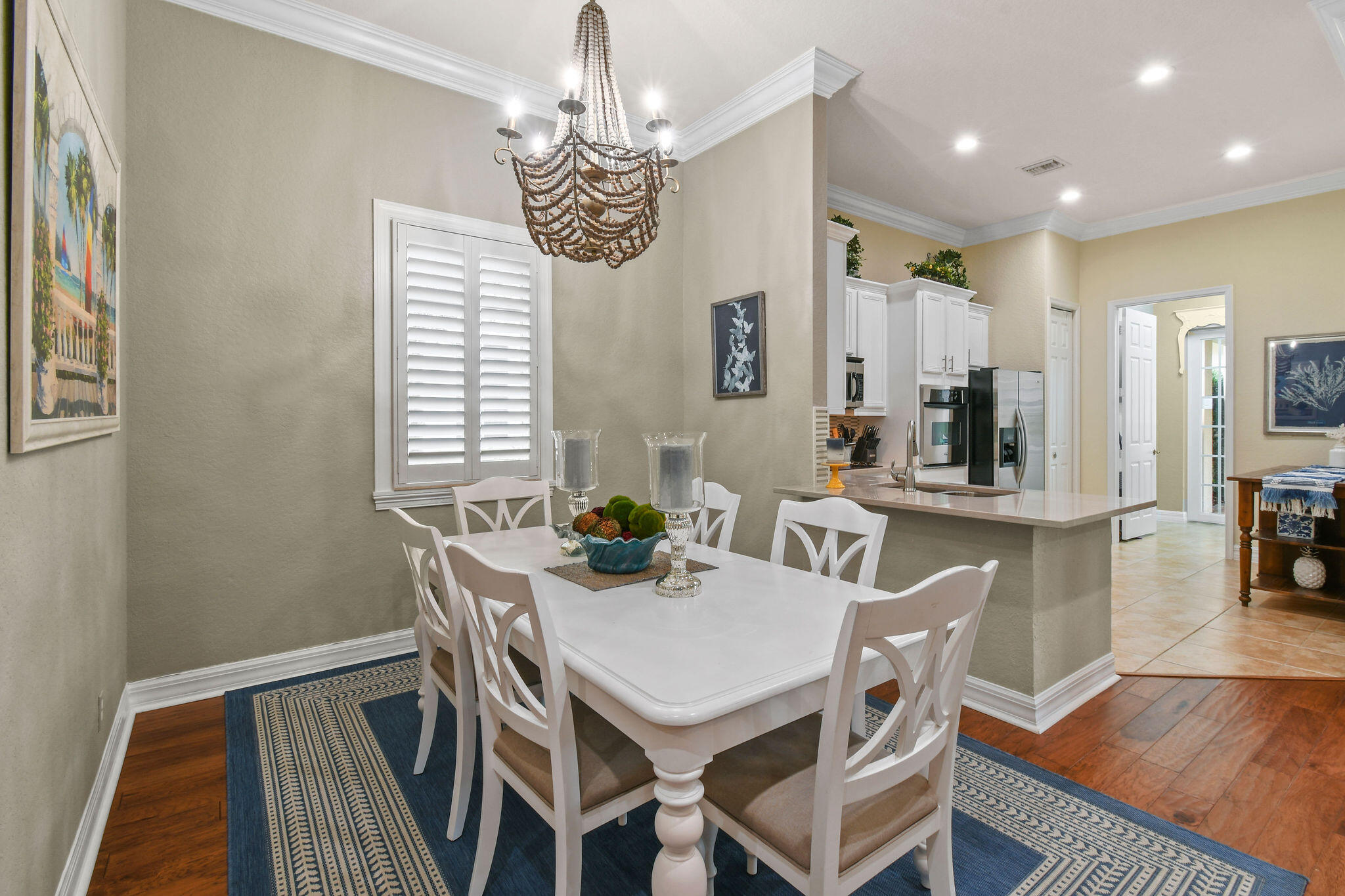 167 Arklow Avenue Jupiter, FL 33458 - Photo 17 of 58 a view of a dining room with furniture window and wooden floor