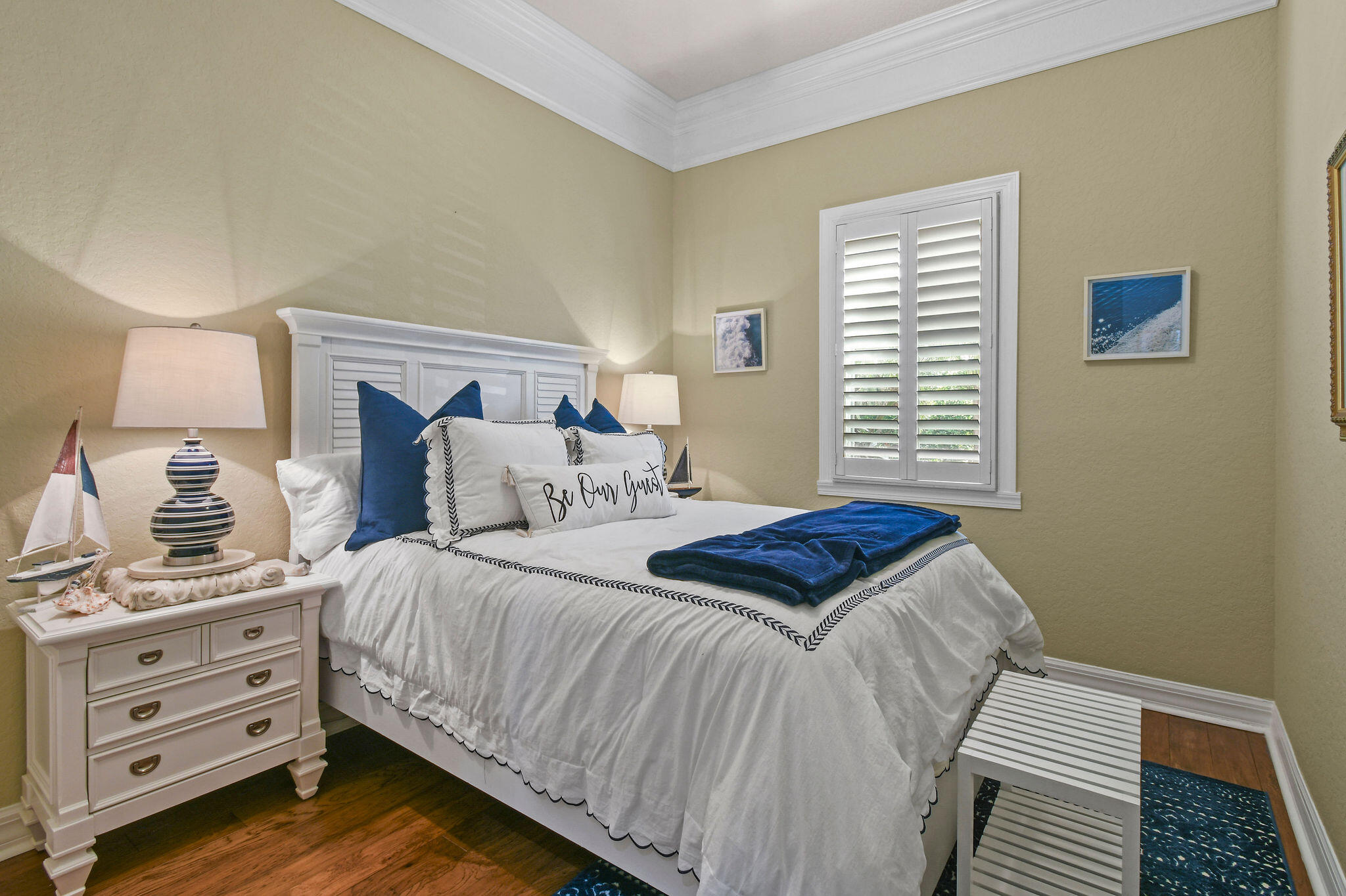 167 Arklow Avenue Jupiter, FL 33458 - Photo 28 of 58 a bedroom with a bed and a window