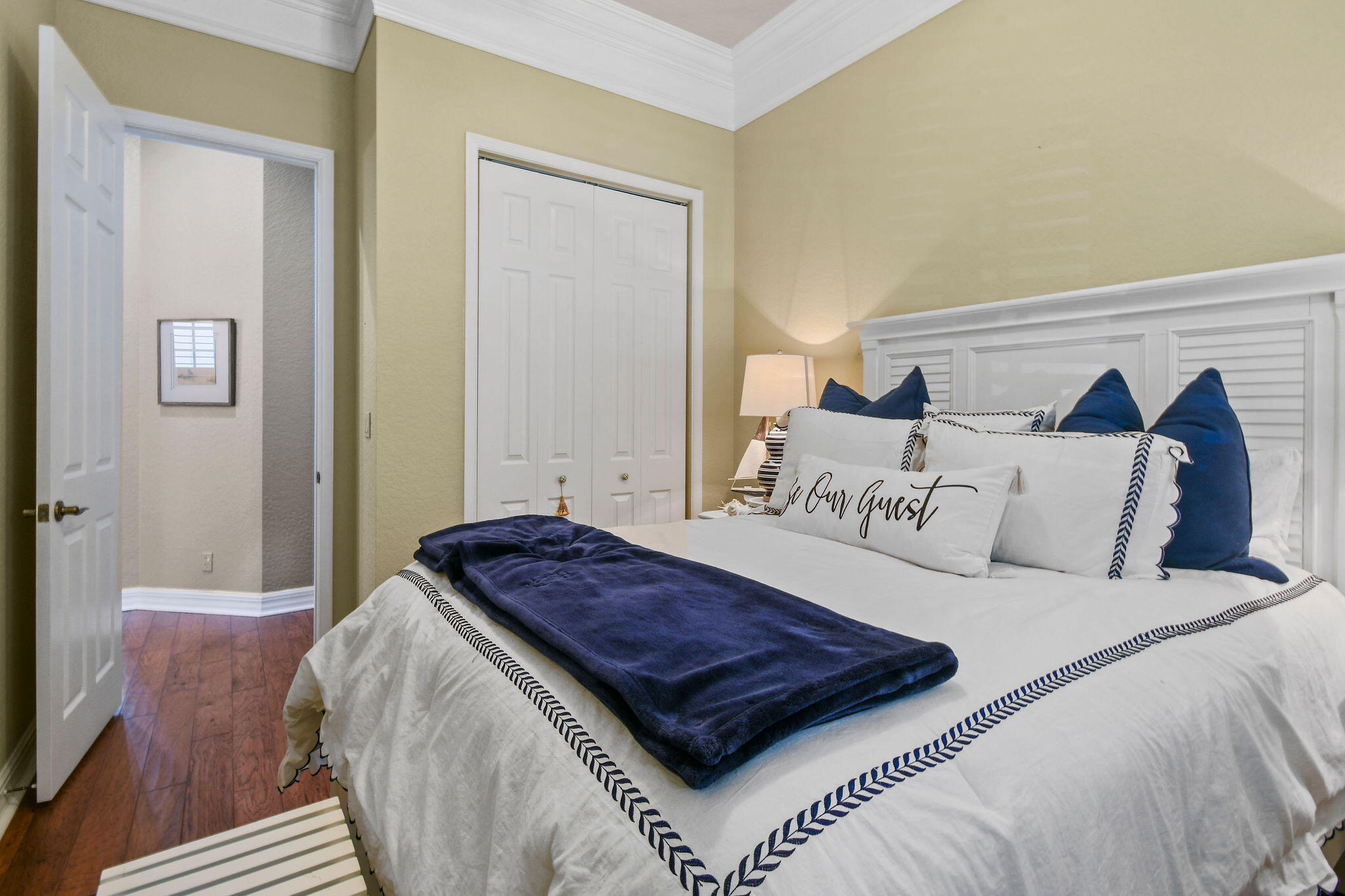 167 Arklow Avenue Jupiter, FL 33458 - Photo 29 of 58 a bedroom with a bed and a window