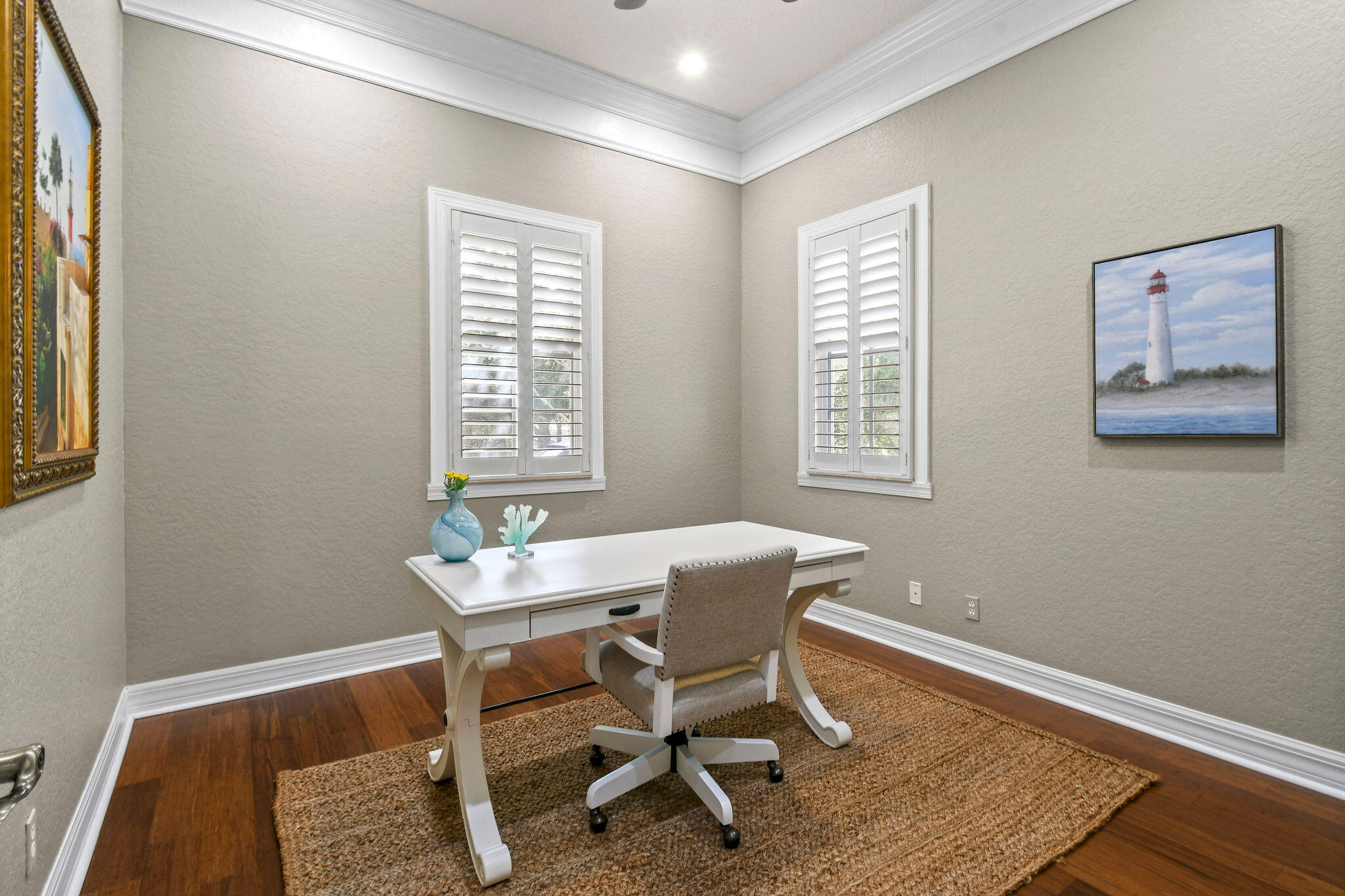 167 Arklow Avenue Jupiter, FL 33458 - Photo 31 of 58 a dining room with wooden floor and a window