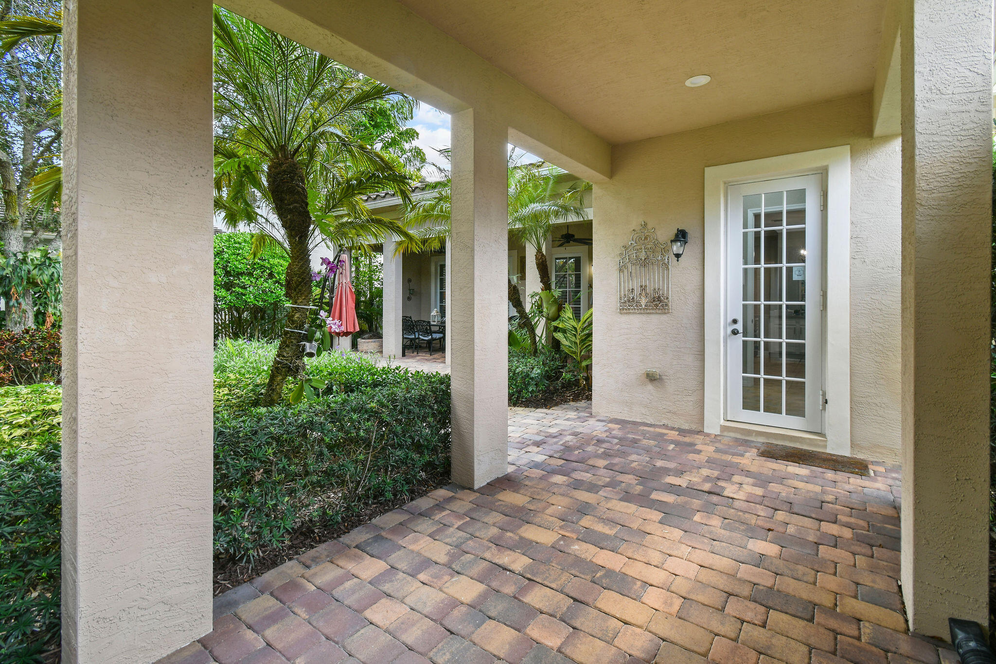 167 Arklow Avenue Jupiter, FL 33458 - Photo 38 of 58 a view of a house with backyard and garden