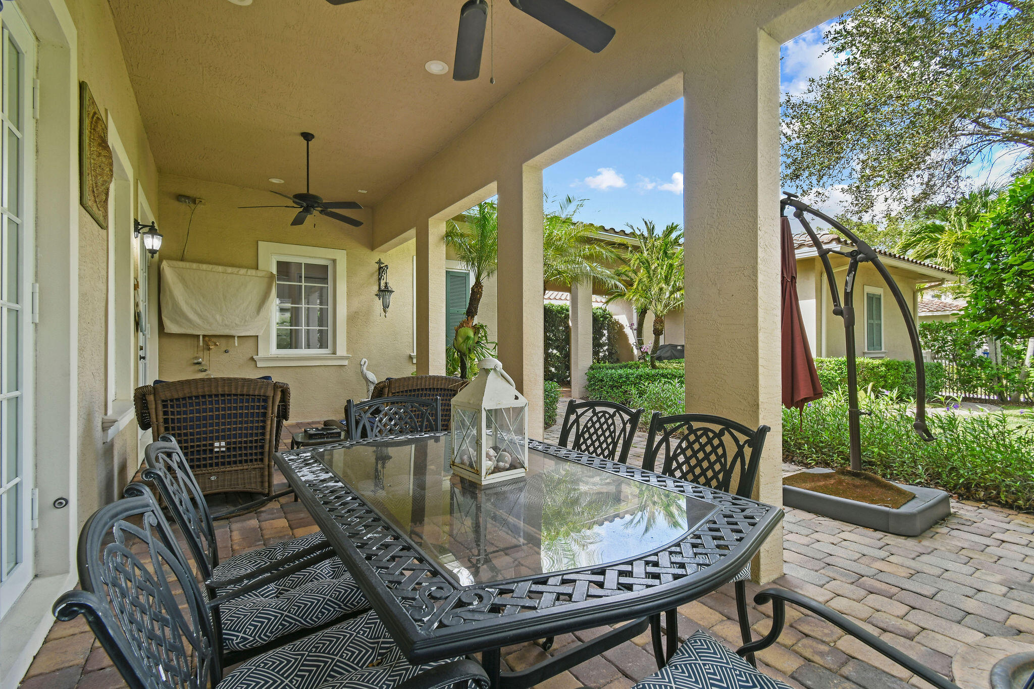 167 Arklow Avenue Jupiter, FL 33458 - Photo 40 of 58 a view of a dining room with furniture window and outside view