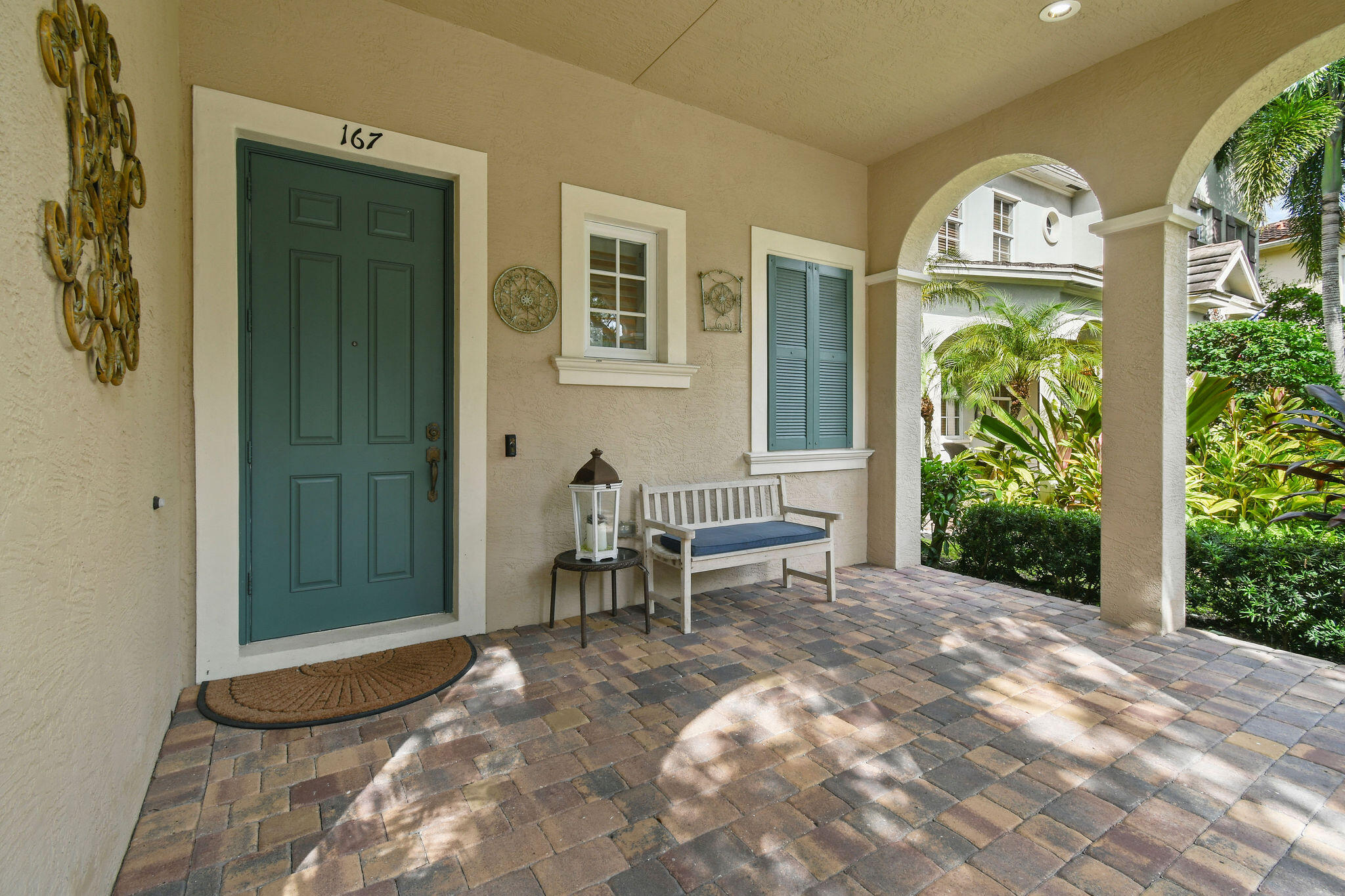 167 Arklow Avenue Jupiter, FL 33458 - Photo 4 of 58 a view of a two chairs in a room with a window