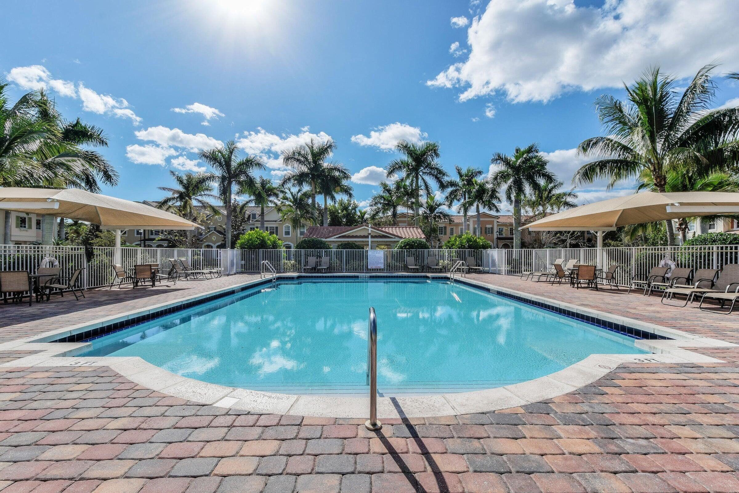167 Arklow Avenue Jupiter, FL 33458 - Photo 50 of 58 a view of a swimming pool with sitting area