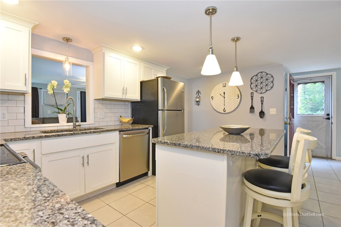25 Edgewood Road Glocester, RI 02814 - Photo 4 of 33 Updated kitchen with Granite counter tops and Stainless Steel appliances