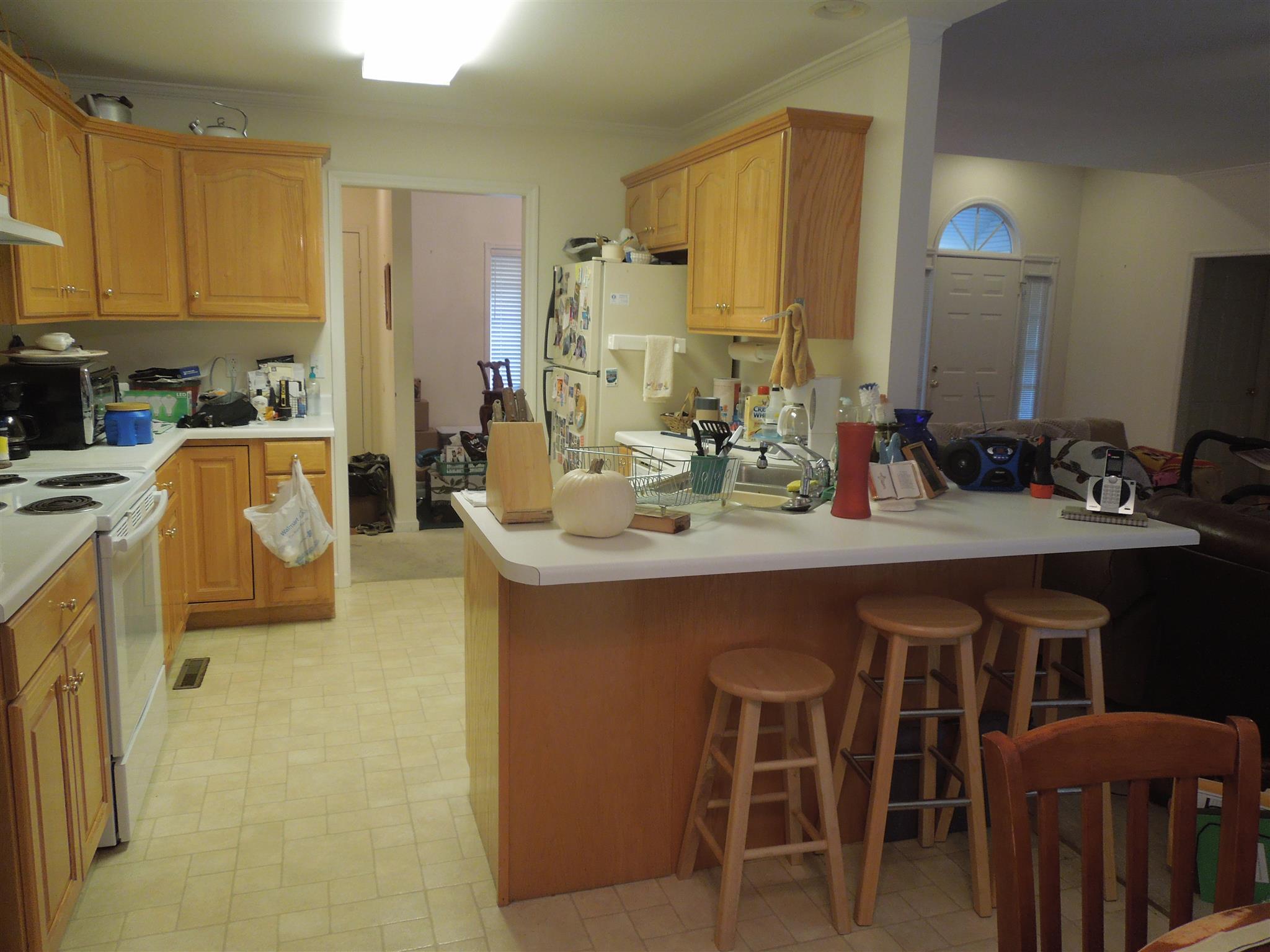 96 Hunt Creek Road Manchester, TN 37355 - Photo 8 of 13 a kitchen with a sink dining table and chairs