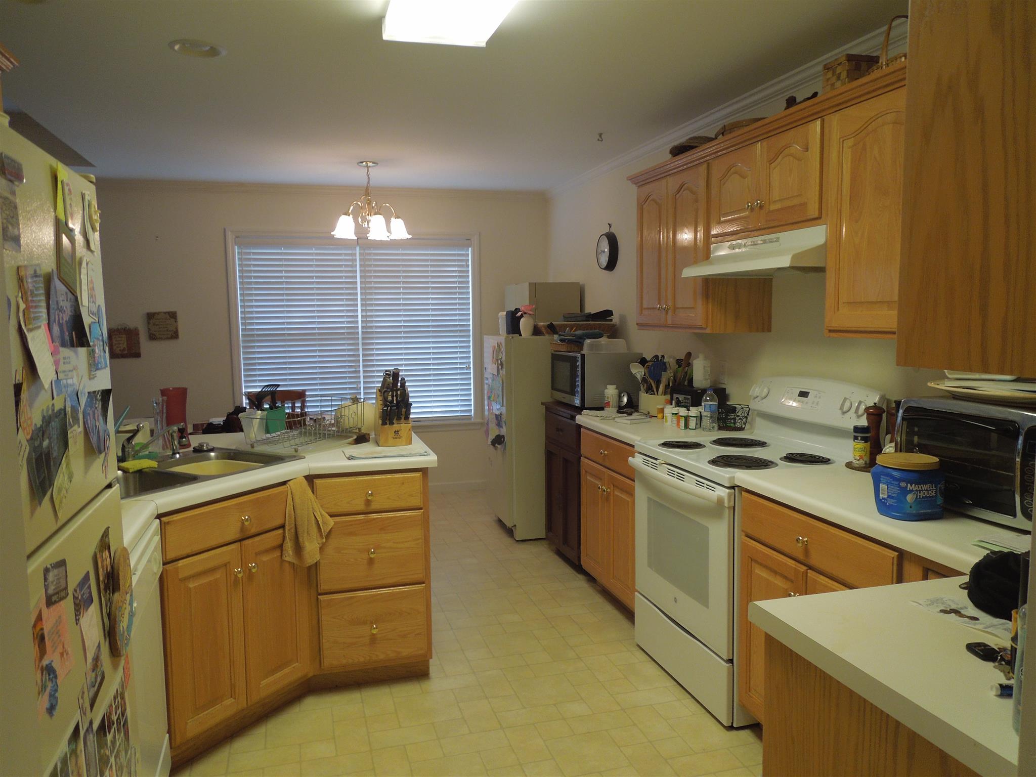 96 Hunt Creek Road Manchester, TN 37355 - Photo 9 of 13 a kitchen with a sink stove and cabinets