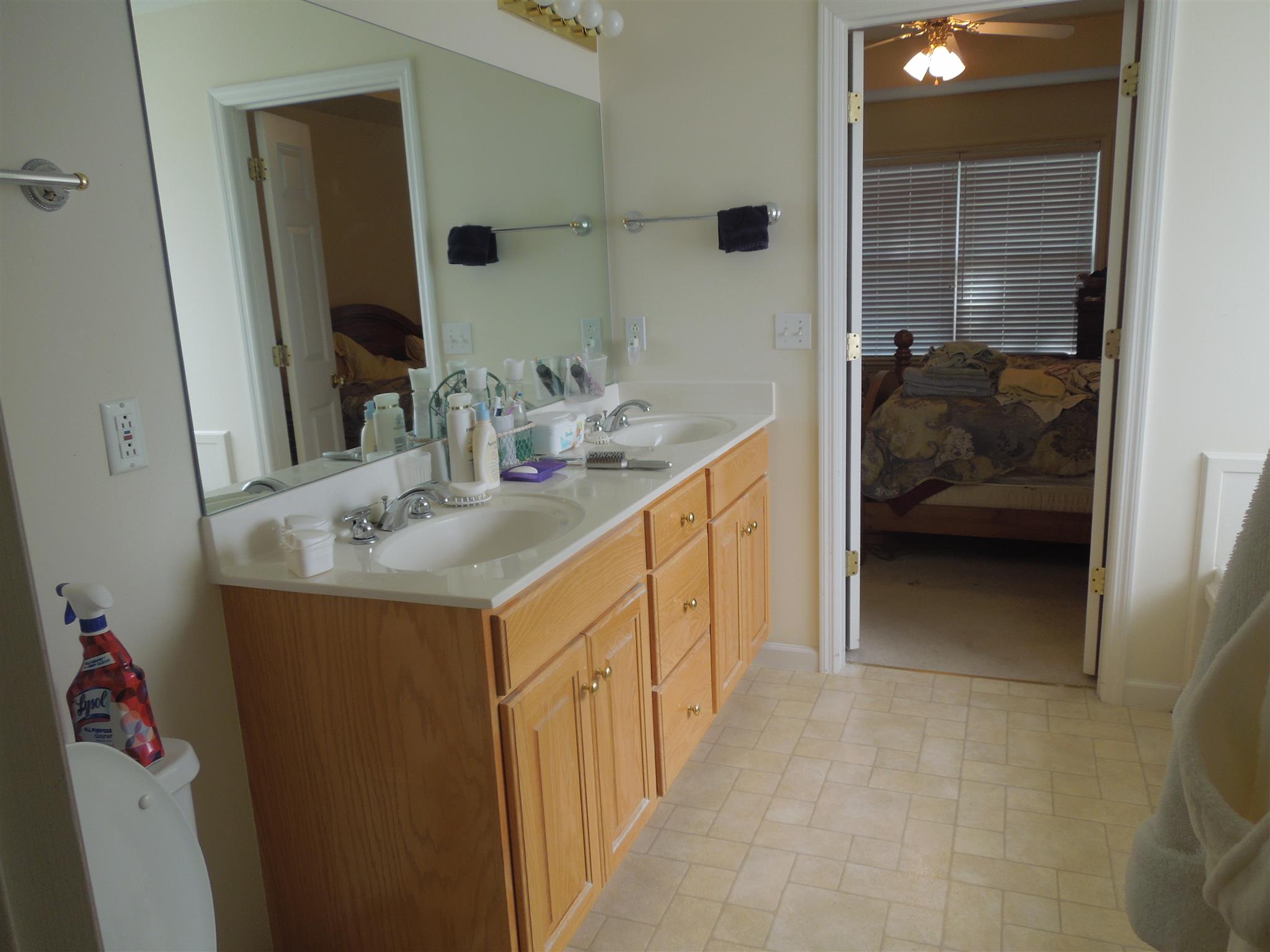 96 Hunt Creek Road Manchester, TN 37355 - Photo 10 of 13 a bathroom with a sink and a mirror