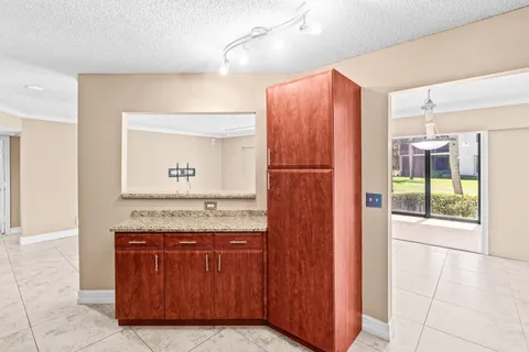 a view of a room with a large window