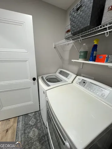 a utility room with dryer and washer