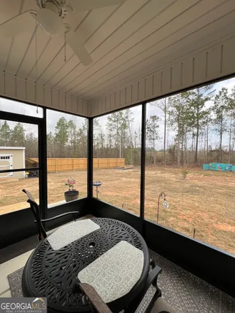 a living room with large pool