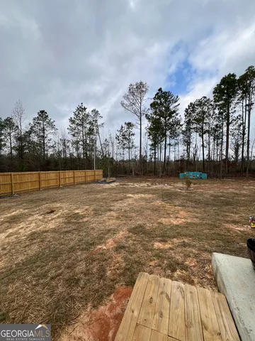 a view of a large swimming pool and outdoor space