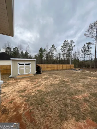 a view of a lake with a big yard