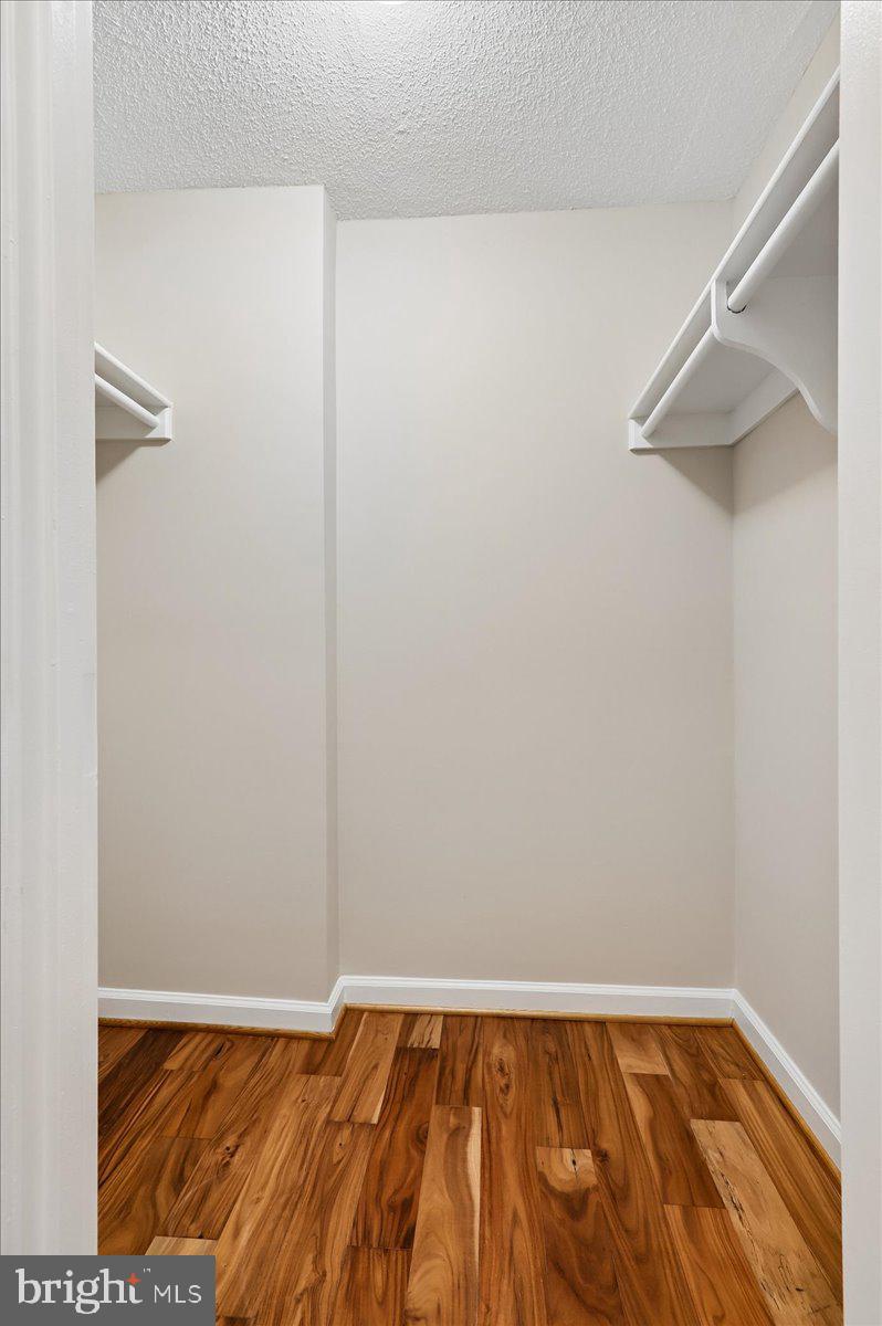 2111 Wisconsin Avenue Northwest, Unit 118 Washington, DC 20007 - Photo 21 of 61 a view of a room with wooden floor and small space
