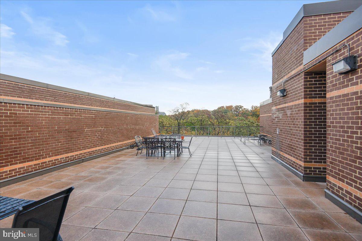 2111 Wisconsin Avenue Northwest, Unit 118 Washington, DC 20007 - Photo 50 of 61 a view of outdoor space with seating